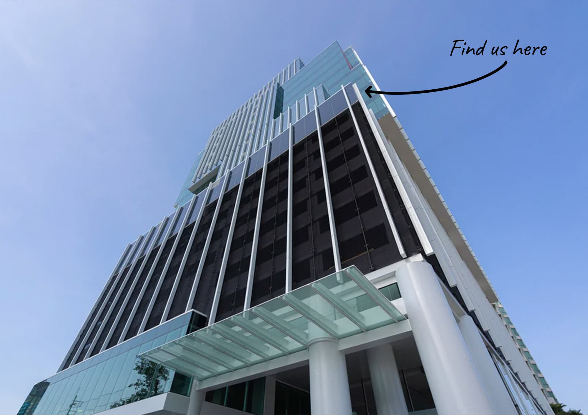 Sathorn Prime tower exterior with Find us here marker